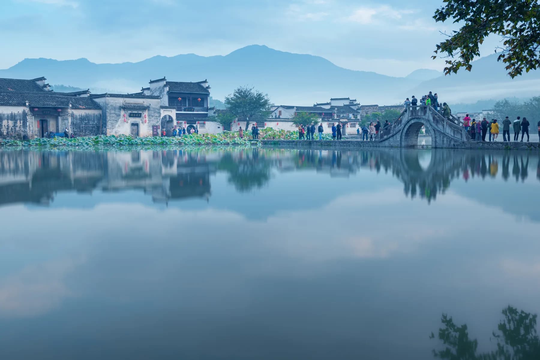 Feng shui landscape relationships visible in a traditional Chinese village set between water and protective hills