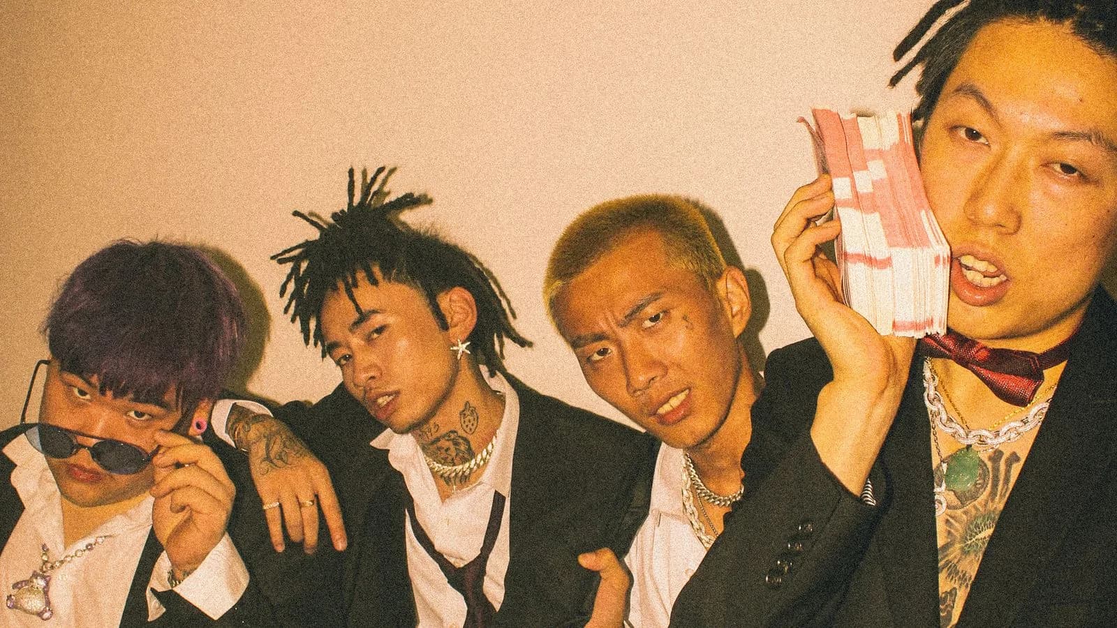 Higher Brothers members Masiwei KnowKnow Psy P and Melo photographed together during their North American tour