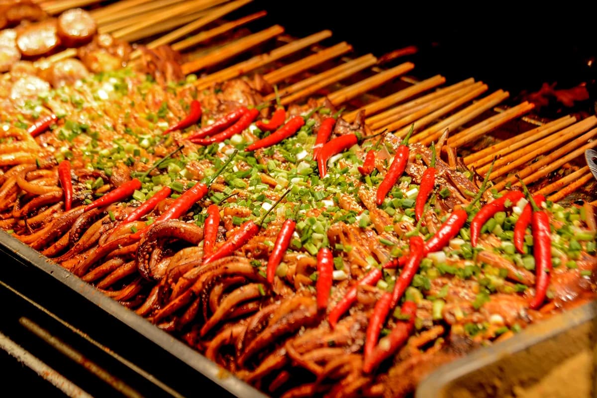 Spicy skewers at Chengdu Jinli night market during a Chinese food trip