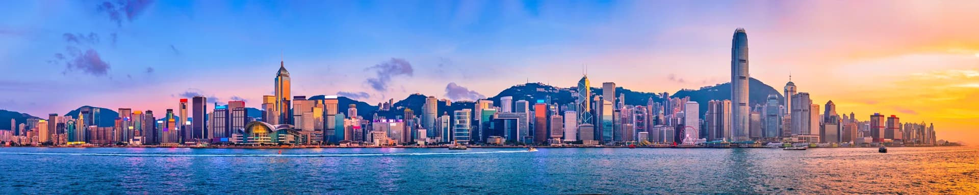 Victoria Harbour at sunset for travelers planning to travel to Hong Kong
