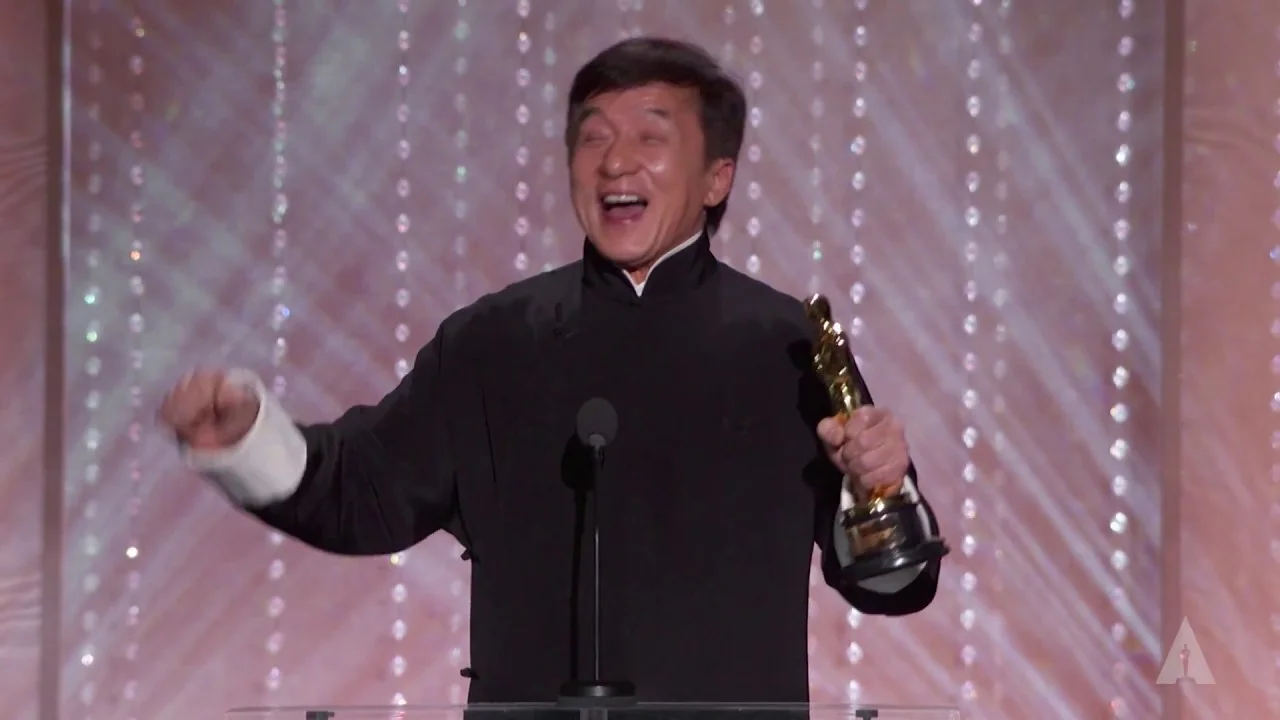 Jackie Chan holding his Honorary Award at the 2016 Governors Awards
