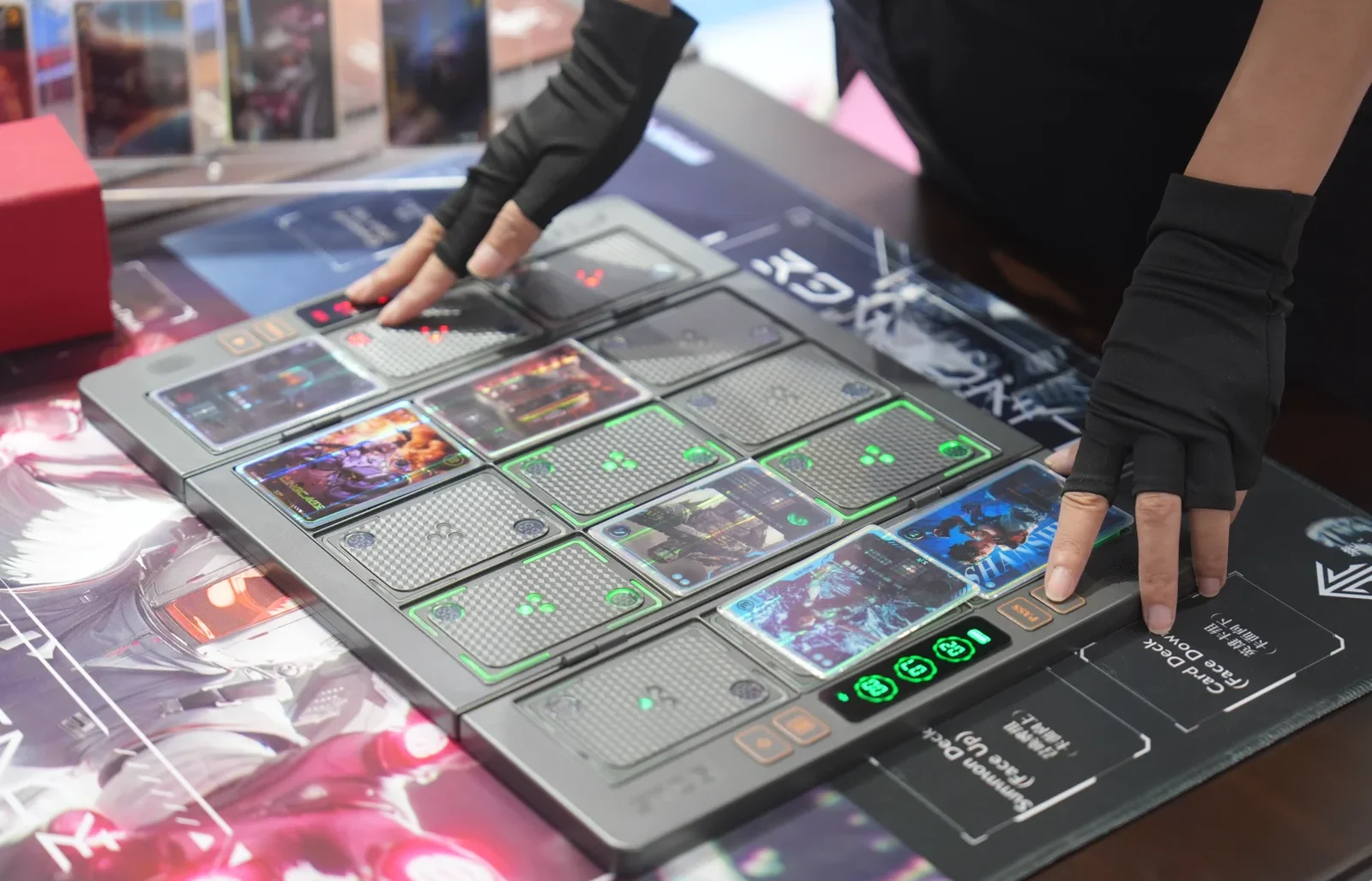 A visitor handling Ling Cage cards on an illuminated interactive table at Shanghai BW