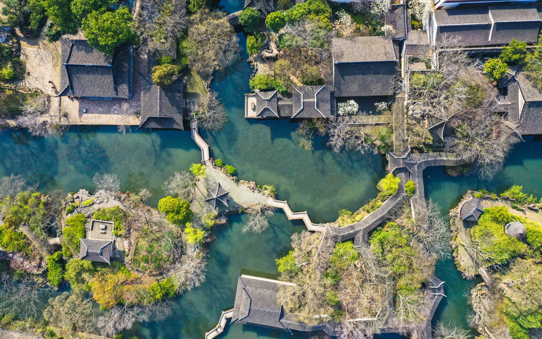 An overhead view of a Suzhou garden showing how rooms, roofs, paths, rock and water form a sequence