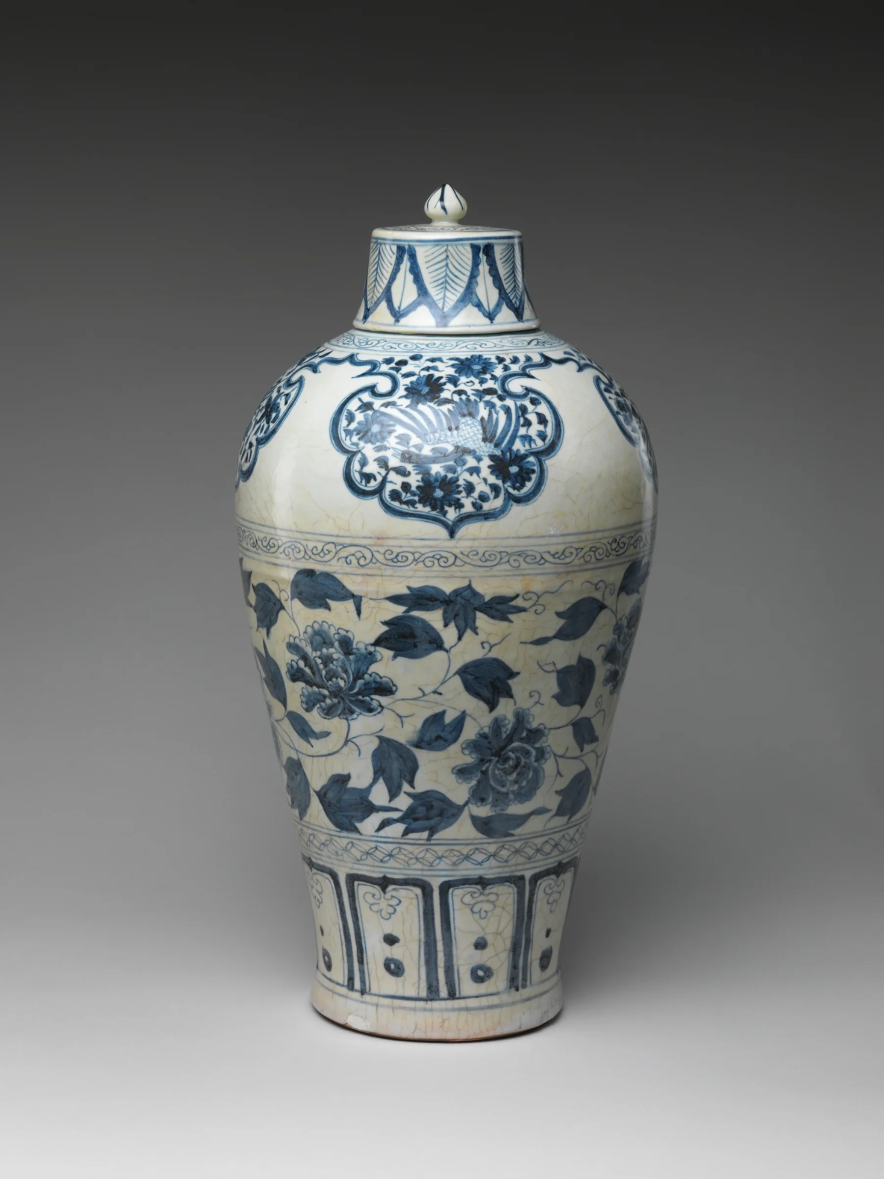 Yuan dynasty Chinese blue-and-white porcelain bottle with cobalt peony scrolls and layered decorative bands