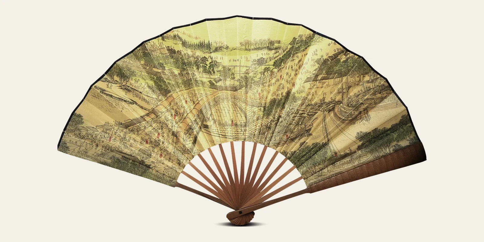 Chinese folding fan opened to reveal a detailed landscape and city scene across its pleated leaf