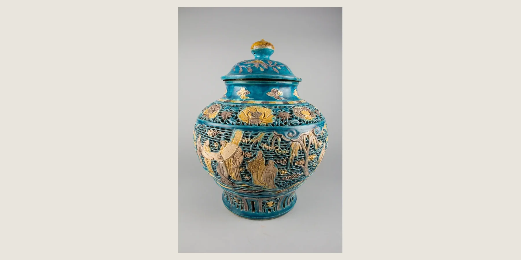 A large sixteenth-century Chinese porcelain covered jar with turquoise fahua glaze and relief decoration