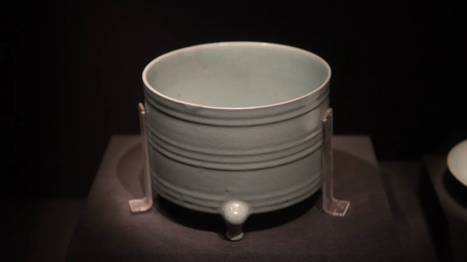 Ru ware zun-shaped vessel with horizontal bowstring bands beneath a light sky-blue glaze