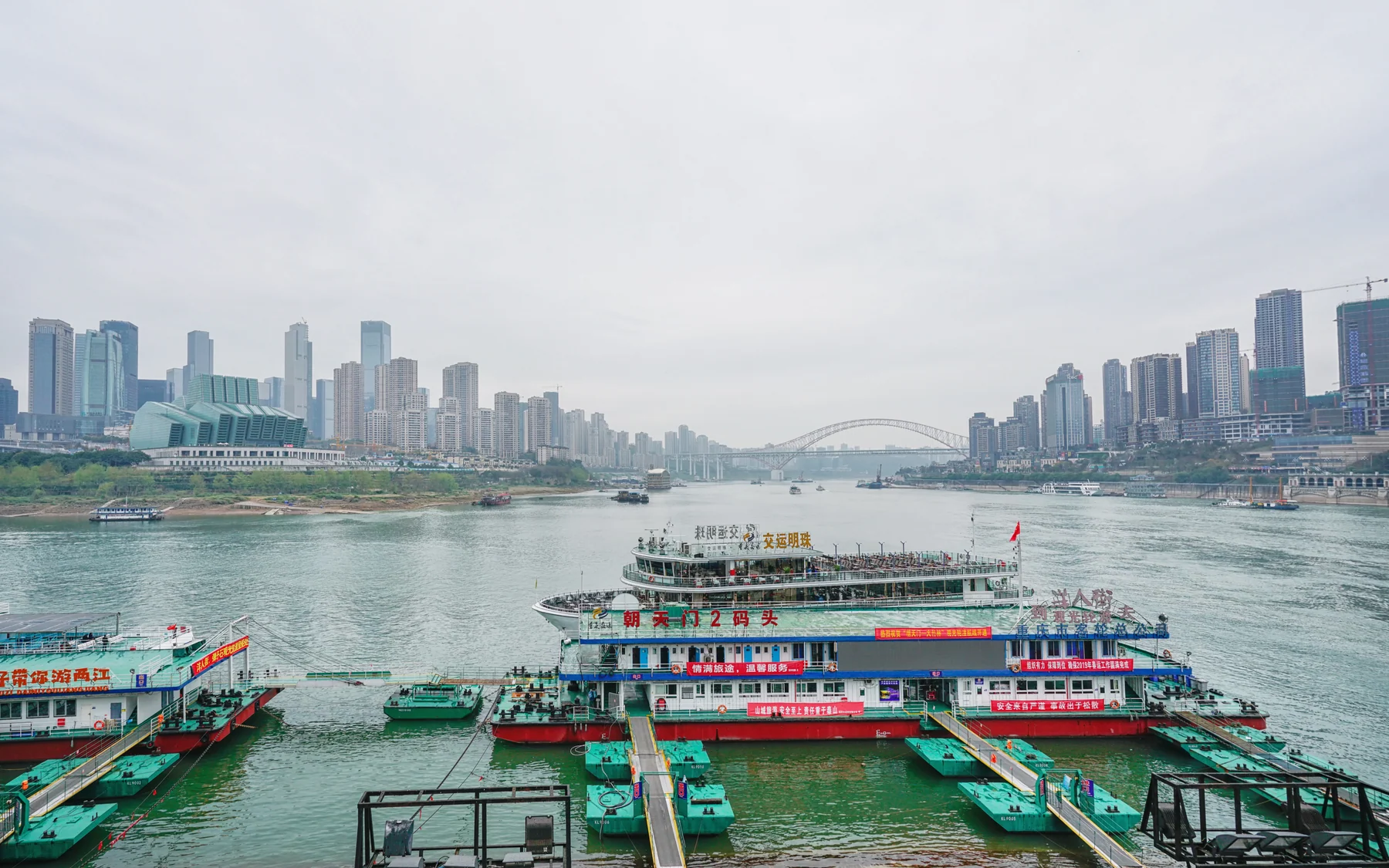 Chongqing's riverfront lights and bridges forming a connected night network