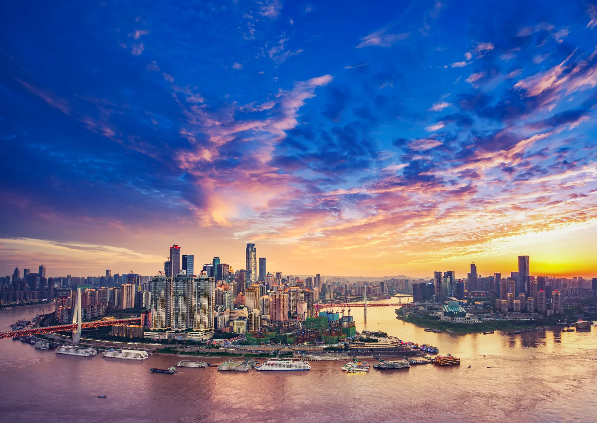 Chongqing at sunset where the Yangtze and Jialing rivers meet around the Yuzhong Peninsula