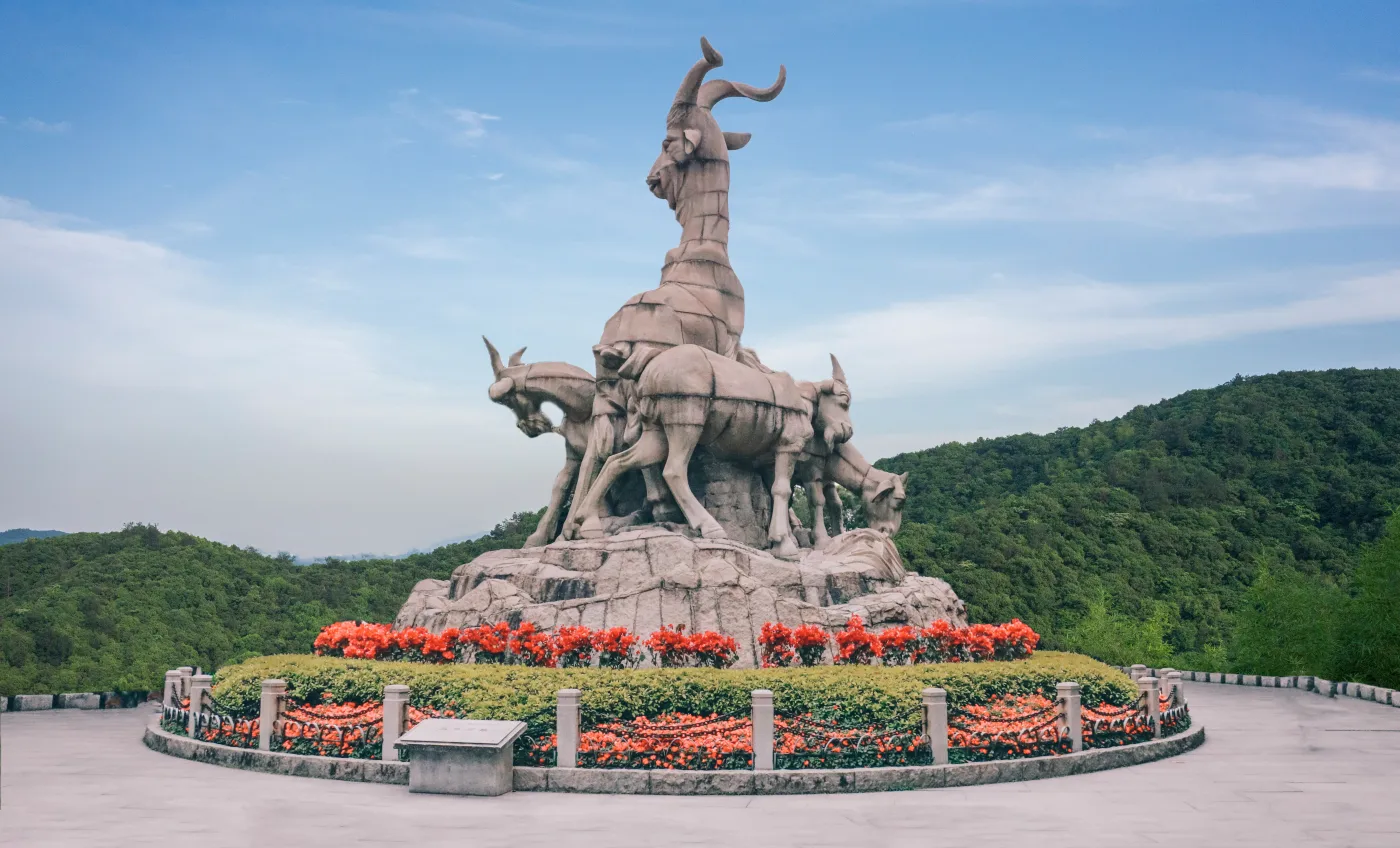 Five Rams sculpture on a rocky rise in Guangzhou