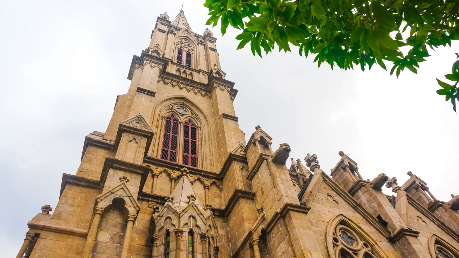 Twin stone towers and Gothic facade of Sacred Heart Cathedral in Guangzhou