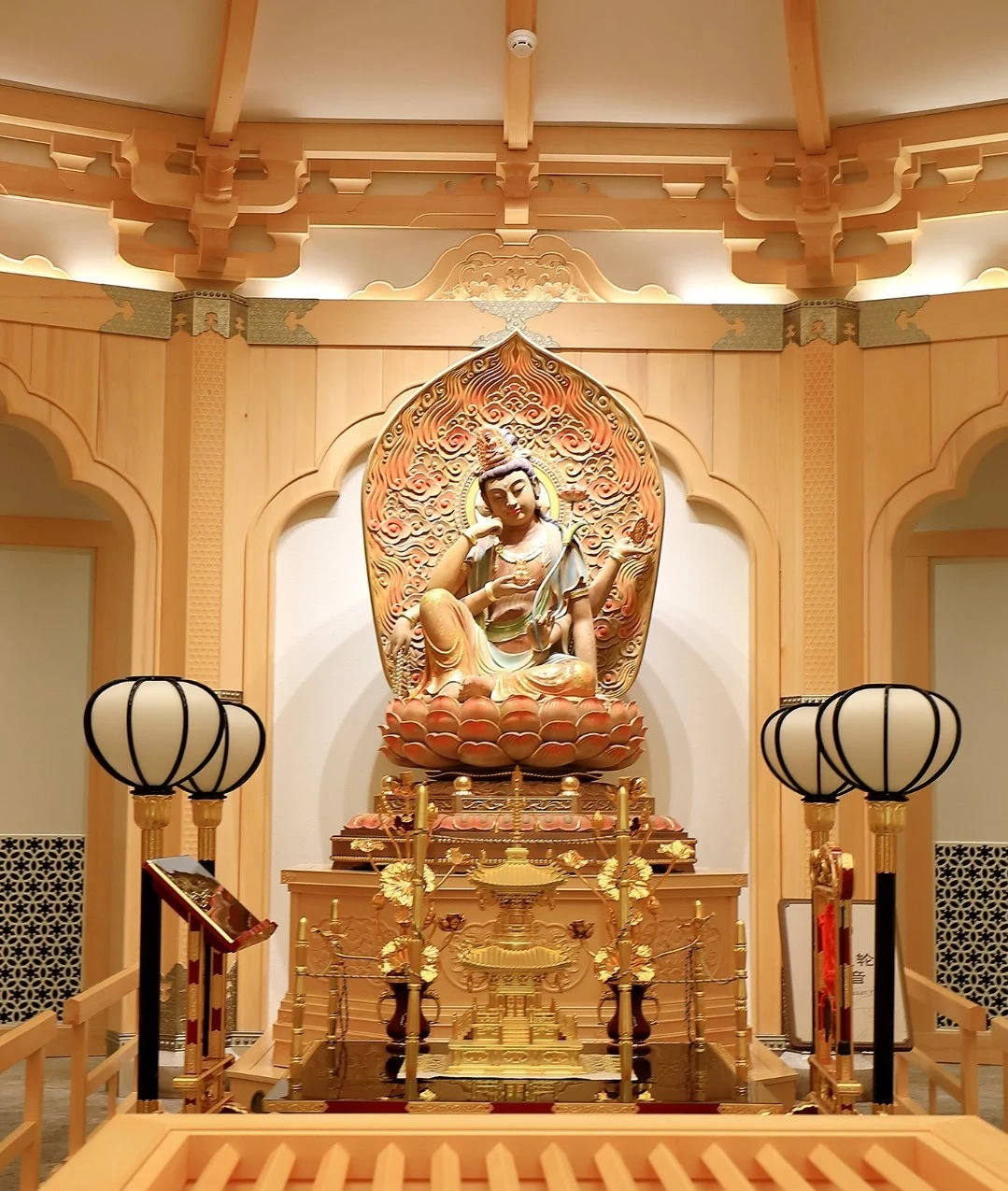 Ruyilun Guanyin at Mount Putuo, showing how a named manifestation is tied to a particular place and ritual landscape