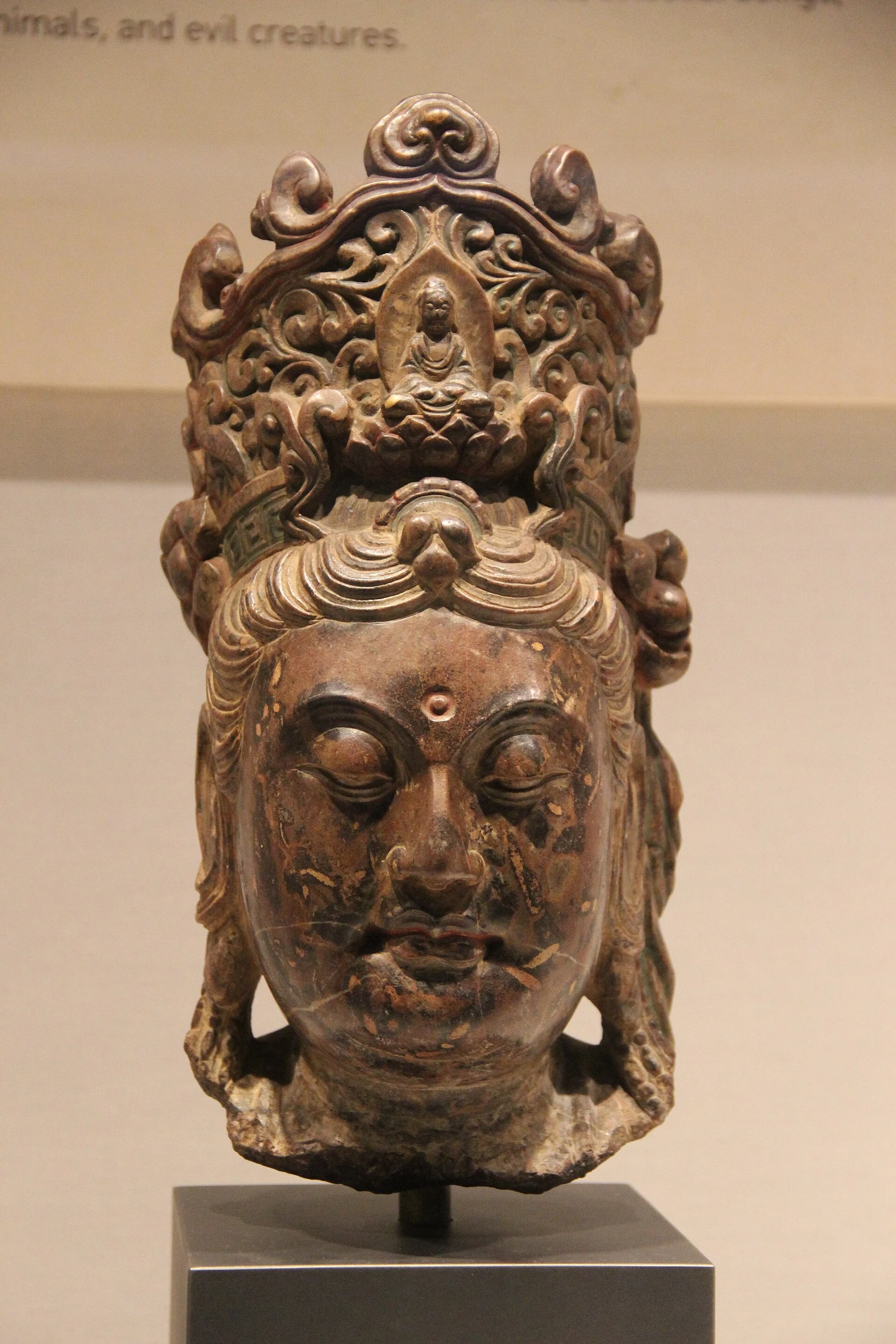 A close view of a Liao-period Guanyin head, showing how facial expression survives across changes in material and scale