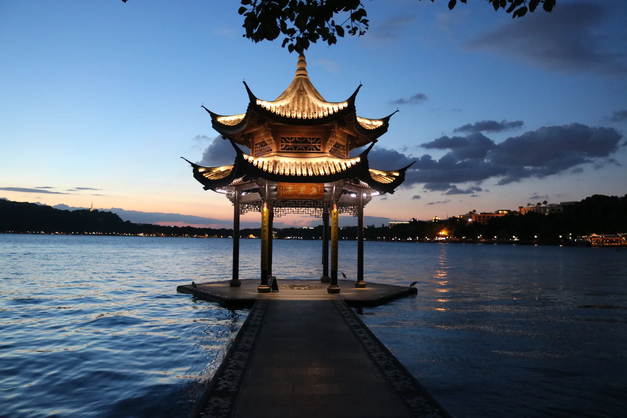 Jixian Pavilion and West Lake in Hangzhou at blue hour