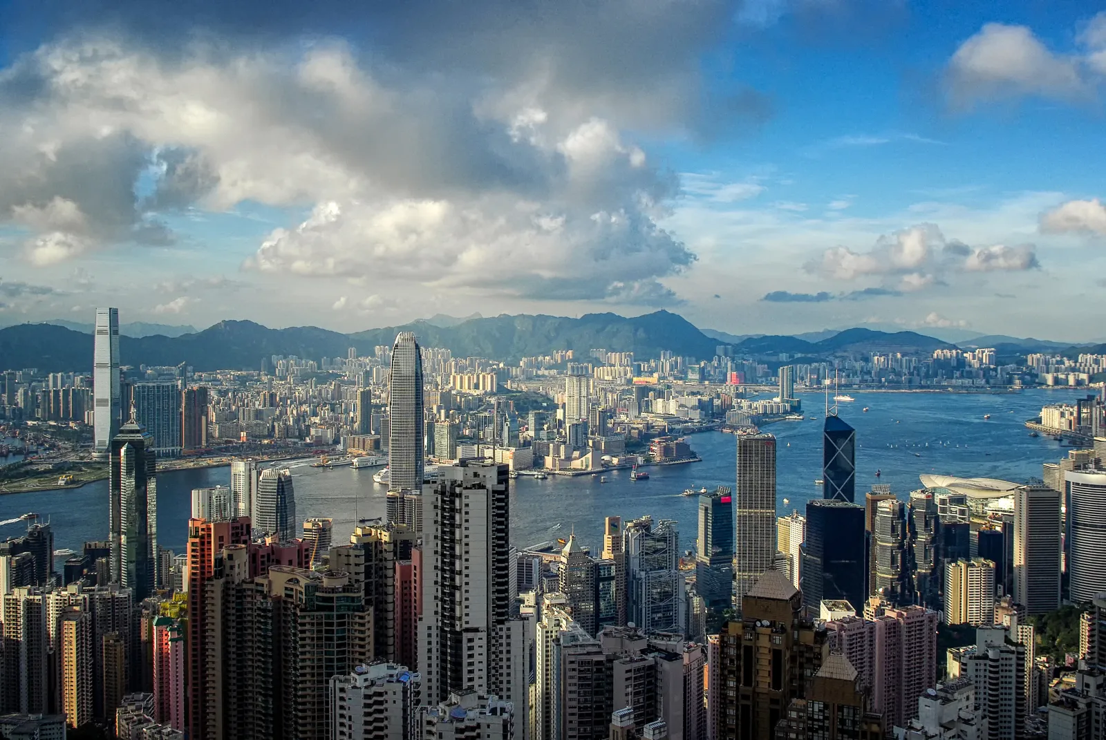 Hong Kong Island, Victoria Harbour and Kowloon seen from Victoria Peak under changing clouds