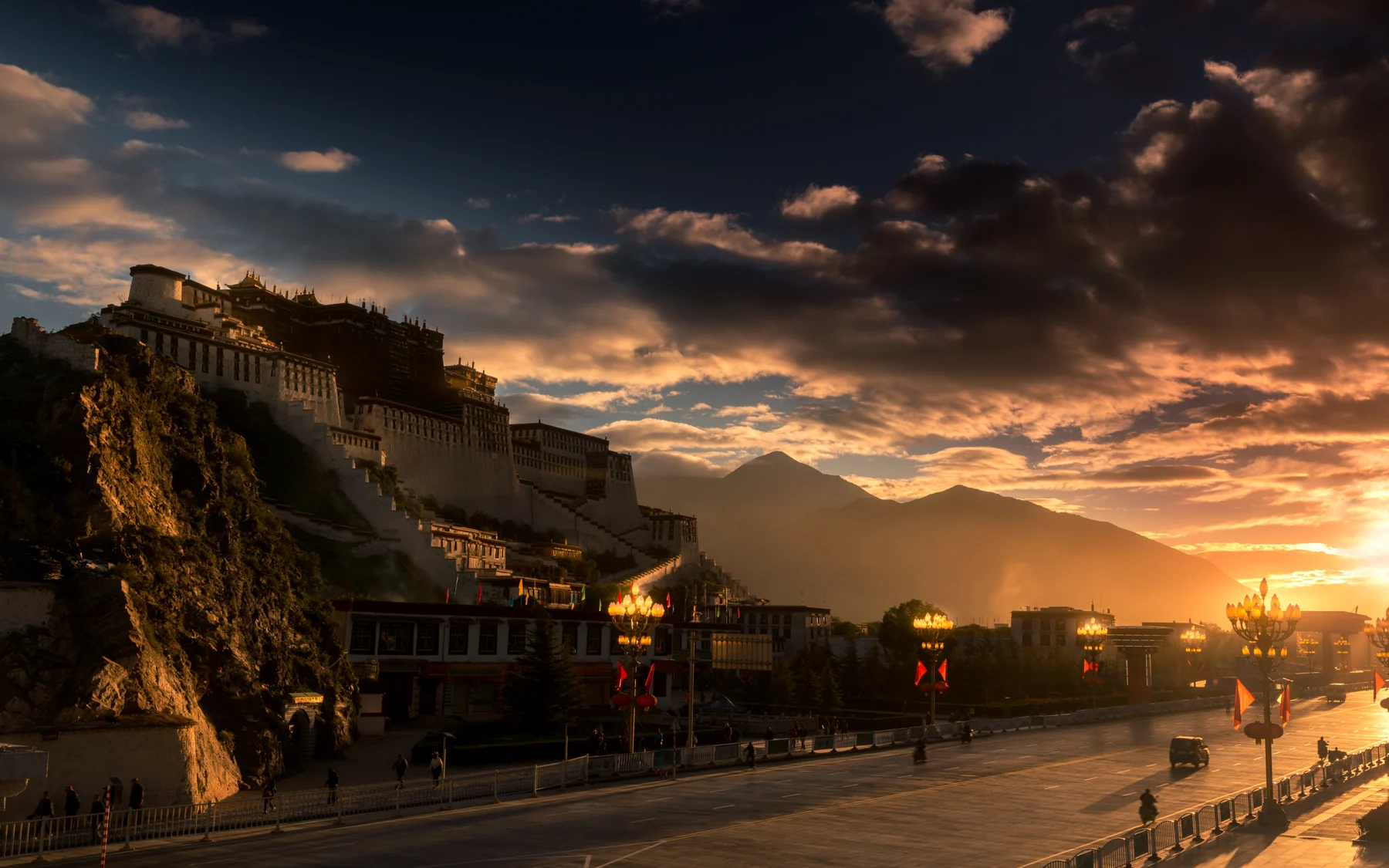 Potala Palace rising above Lhasa in changing highland light