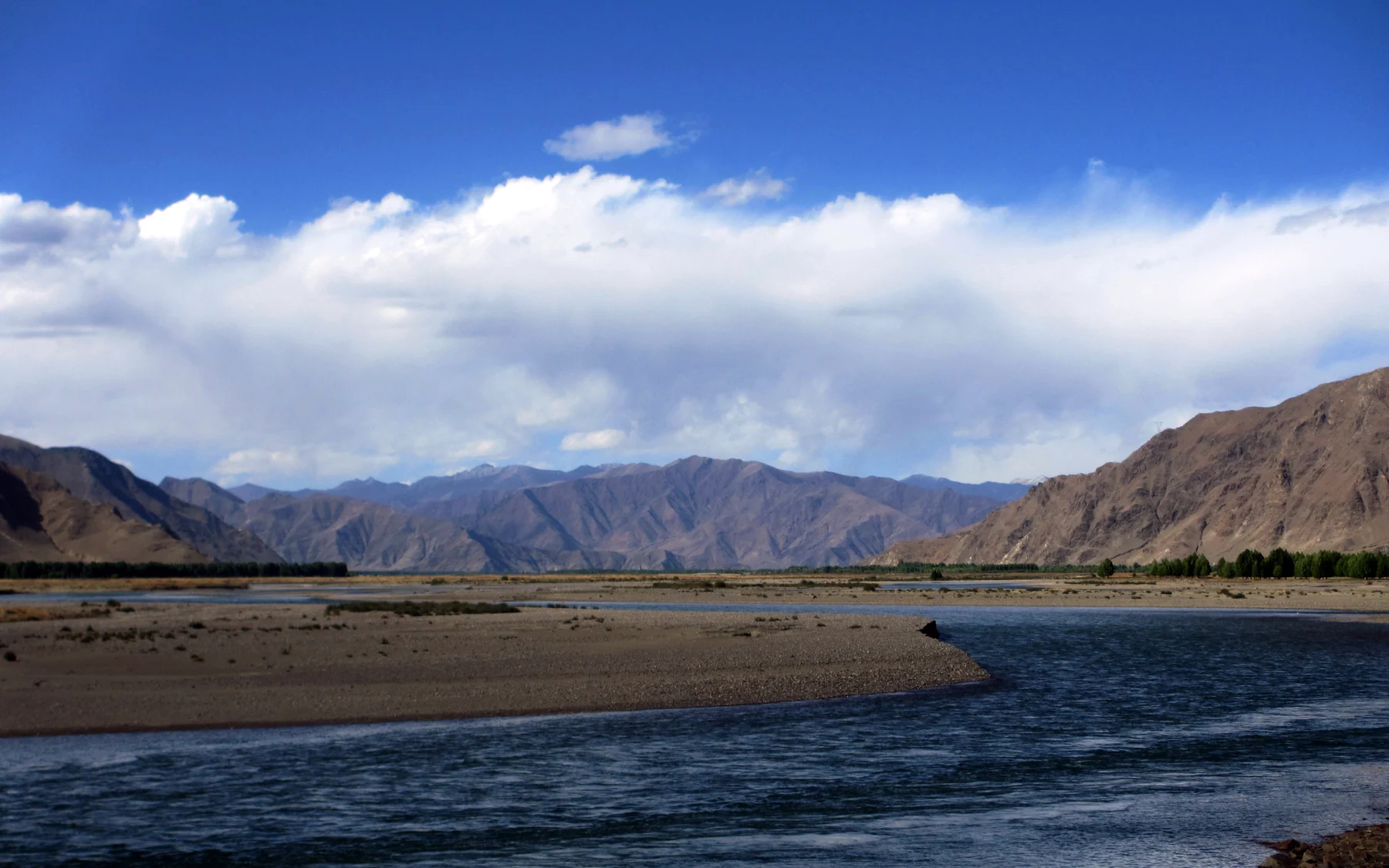The Lhasa River widening the city's view beyond the old centre