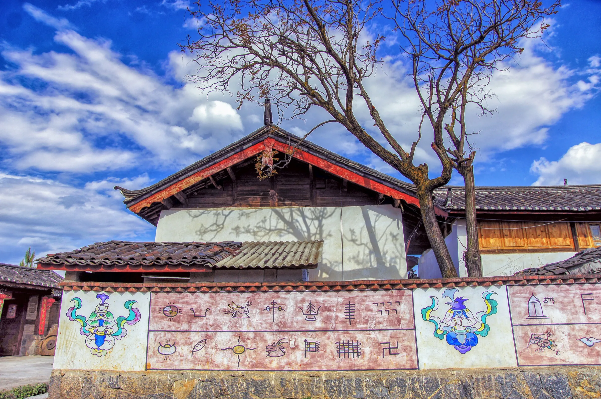 Dongba pictographs and painted figures illustrating Naxi culture in Lijiang