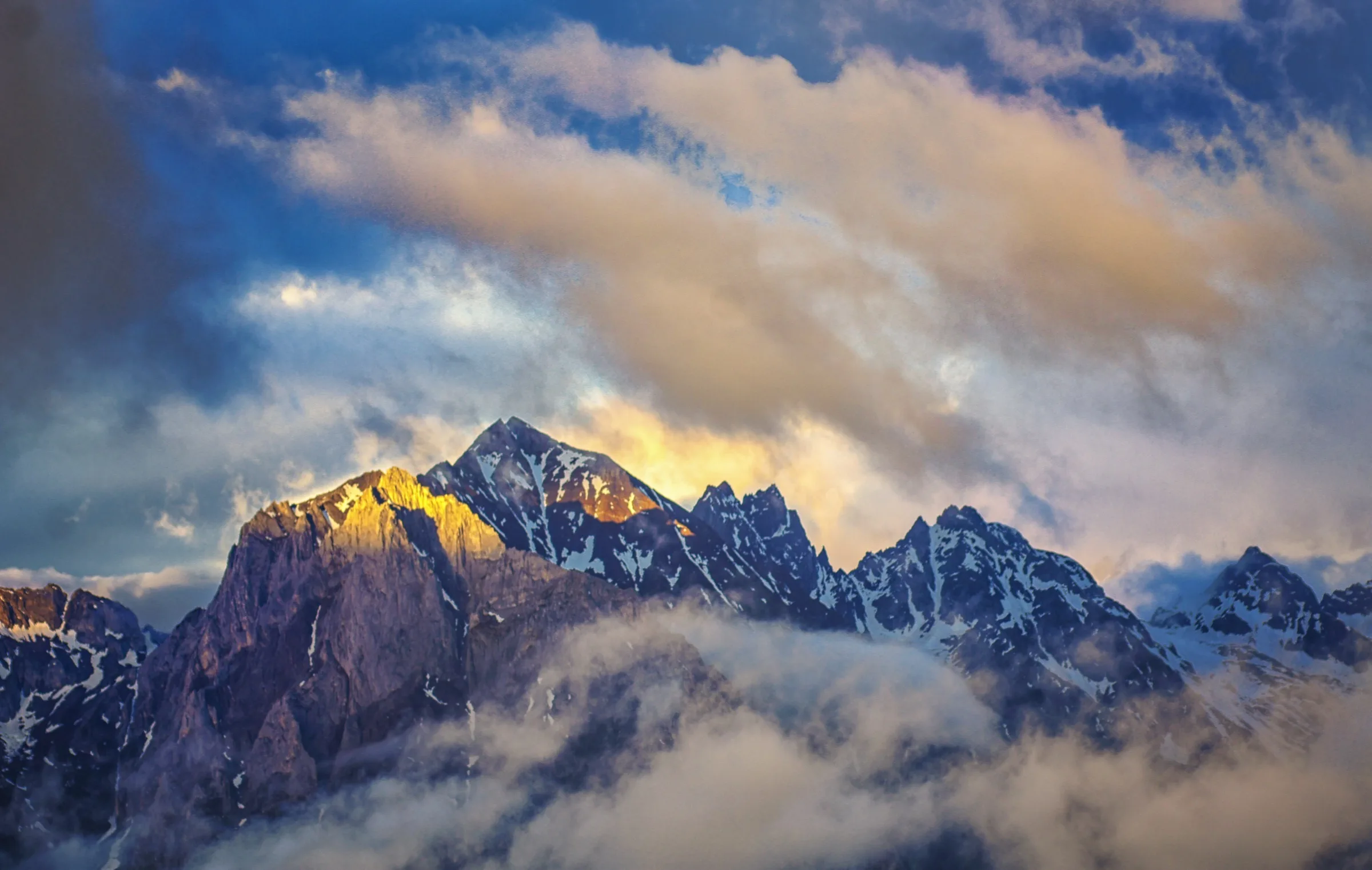 Jade Dragon Snow Mountain catching golden light above Lijiang