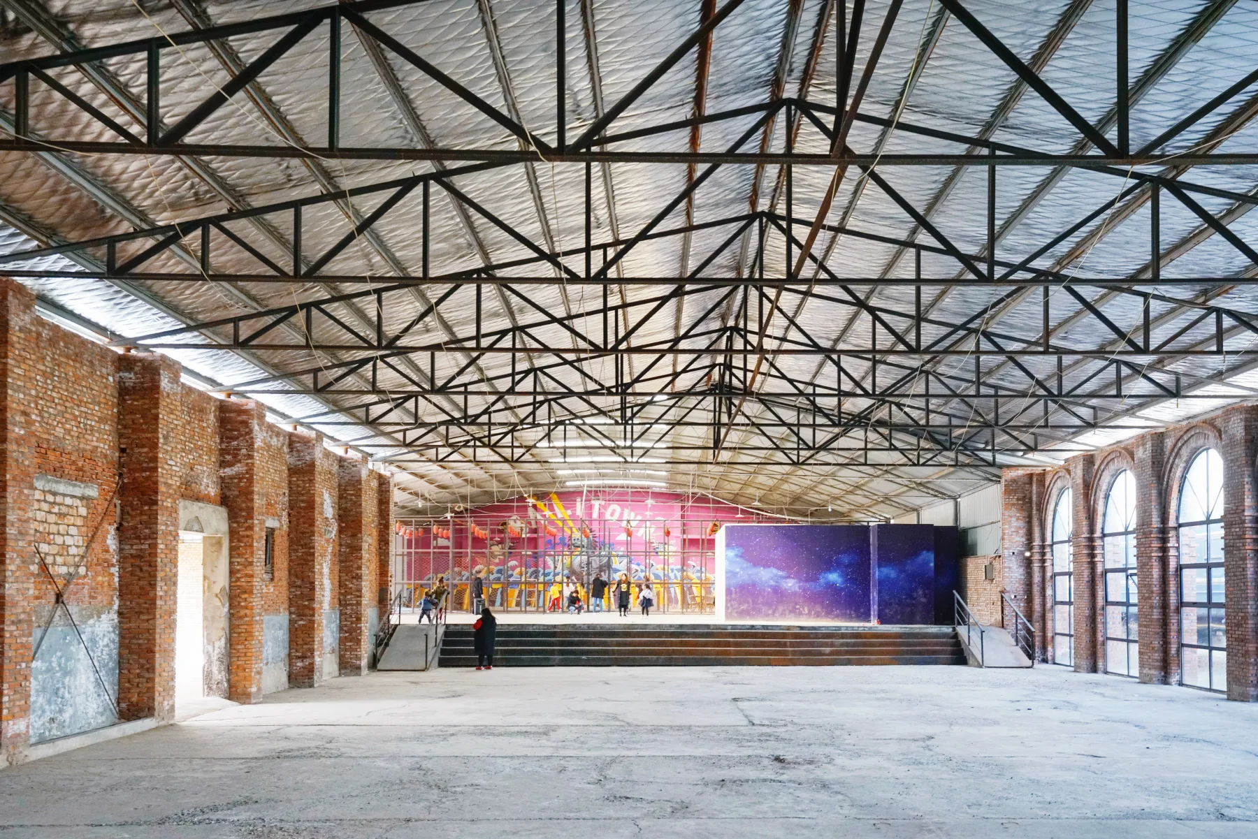 A large reused industrial interior at Luoyang's Balitang creative district