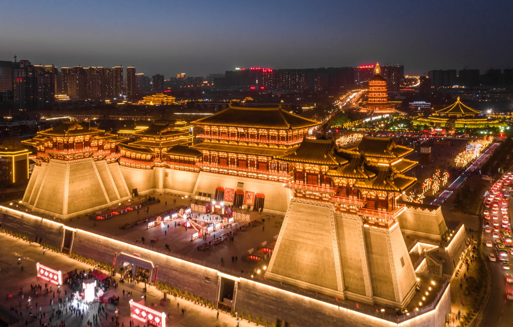 Aerial night view of the illuminated reconstructed Yingtian Gate complex