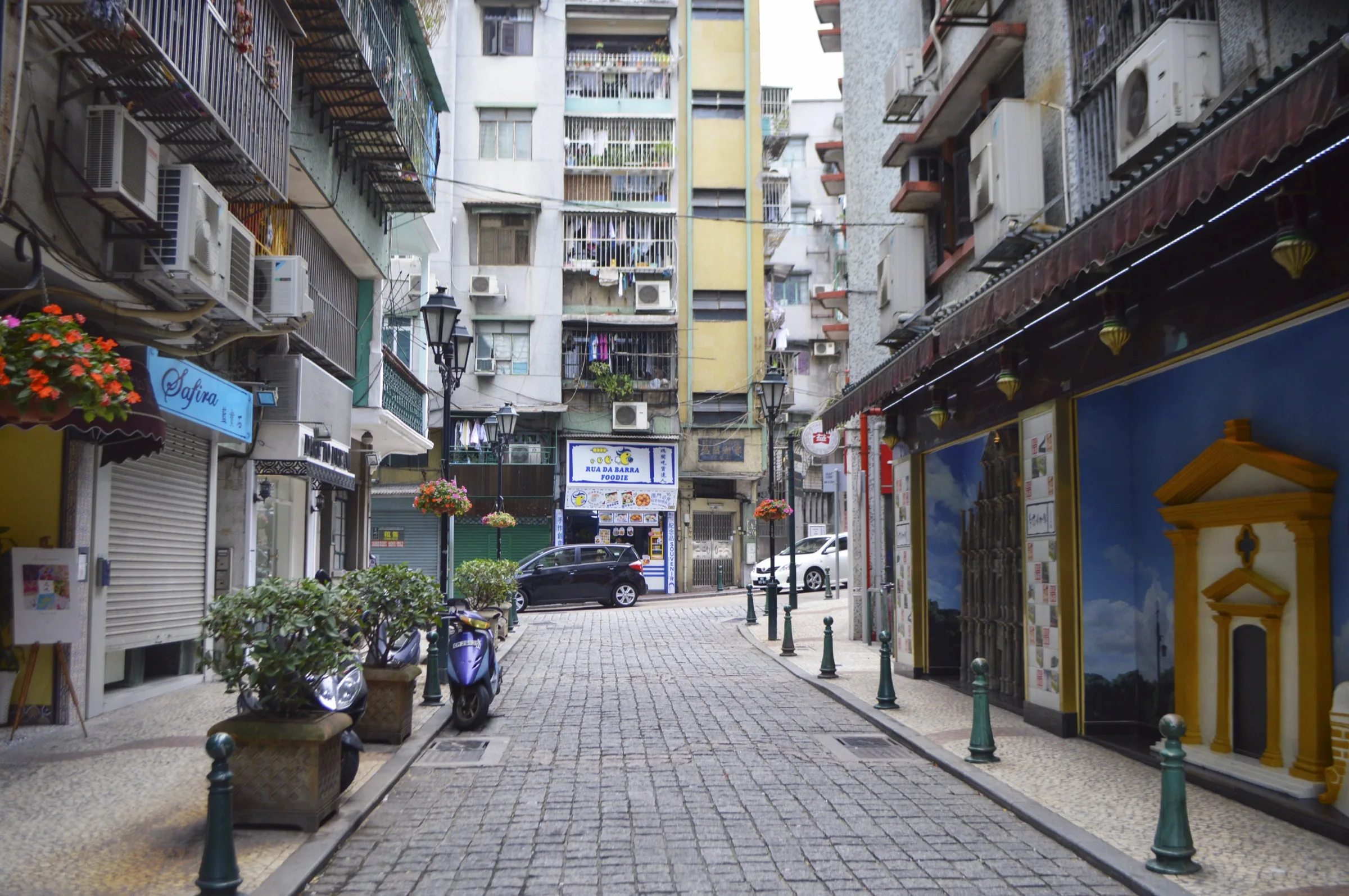 A narrow residential and commercial lane in old Macau