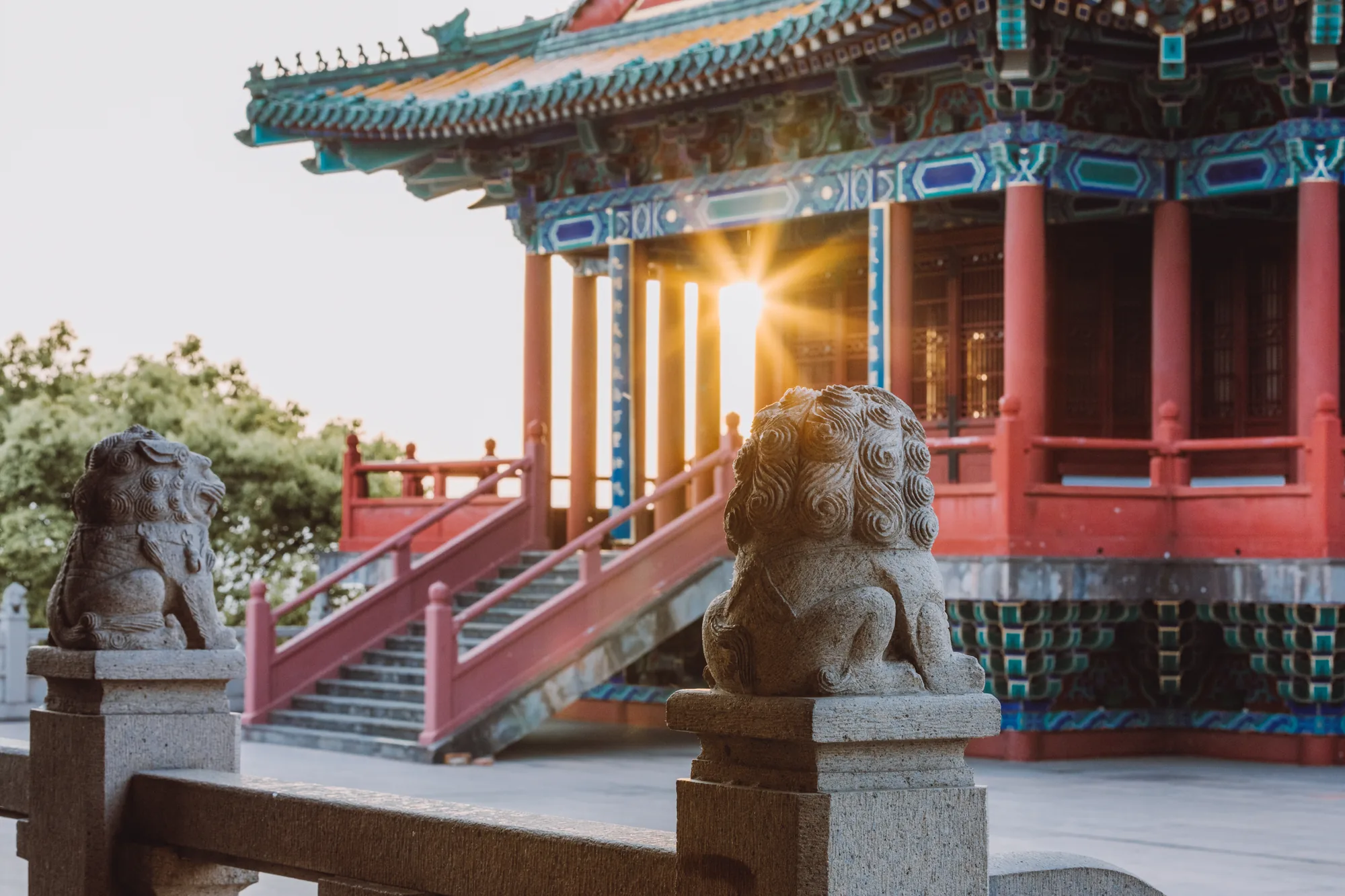 Painted bracket sets, roofs and modern decorative detail at Yuejiang Tower