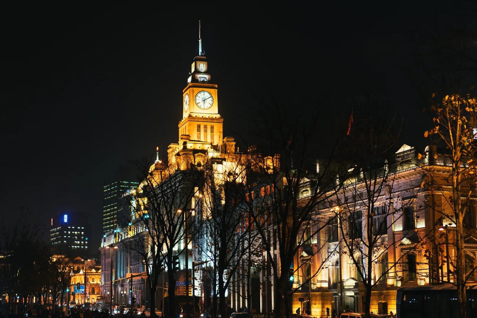 Historic Bund buildings and the Huangpu River under evening light