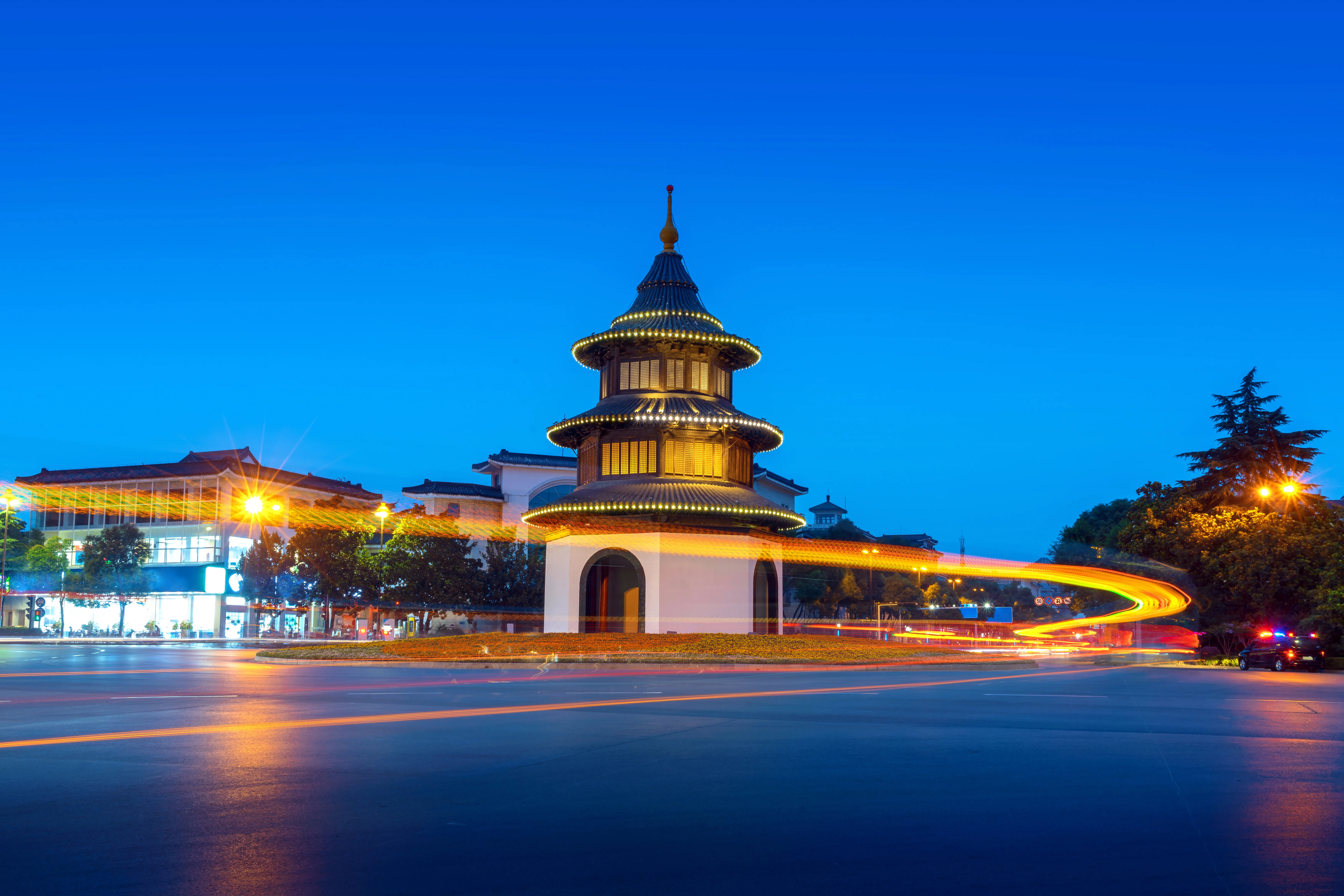 Wenchang Pavilion standing above a central Yangzhou intersection