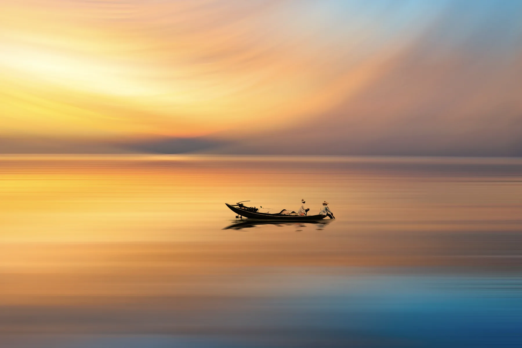 A small boat crossing Longzihu Lake under a golden sky