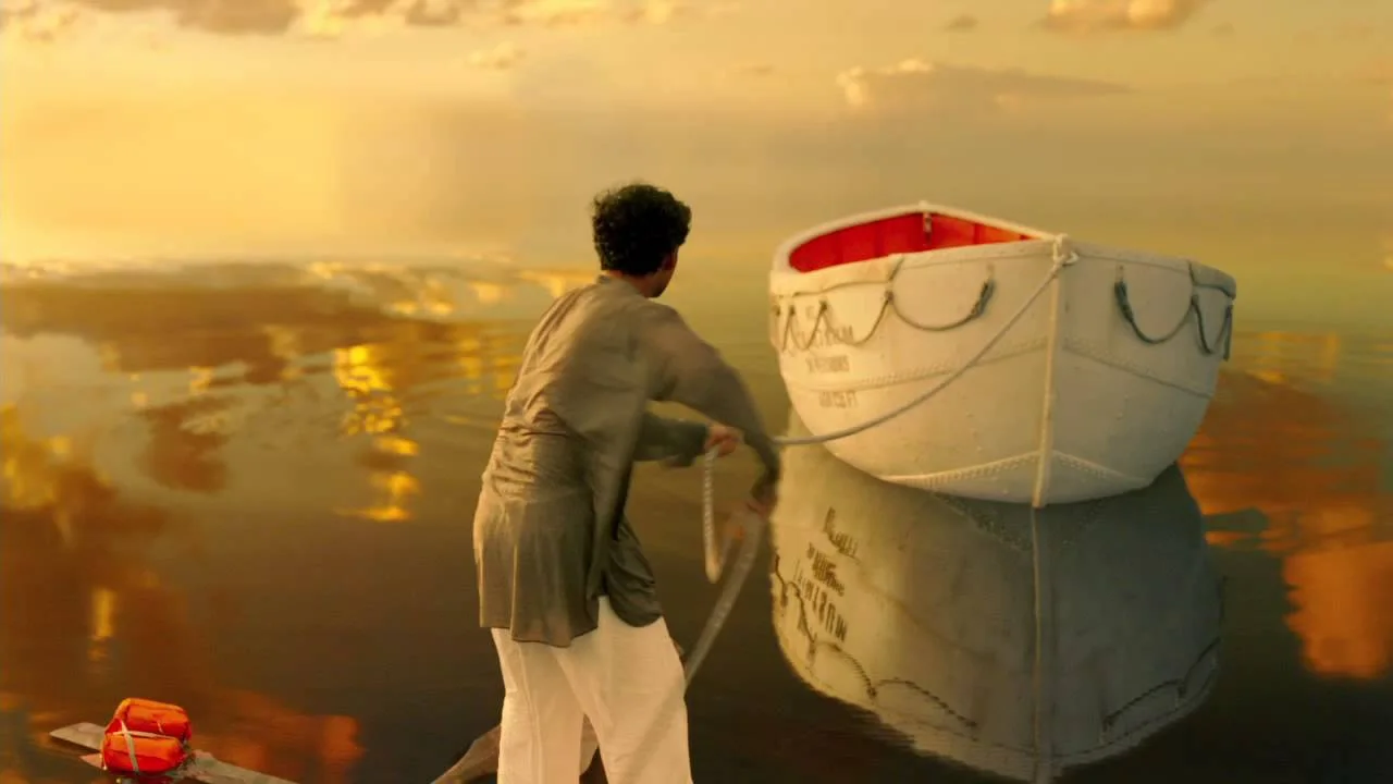 A Life of Pi frame organizing a person, lifeboat, horizon and reflected golden light into one directorial decision