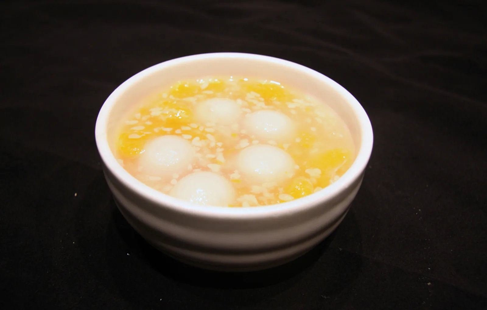 Tangyuan in a fragrant sweet soup representing Chinese desserts