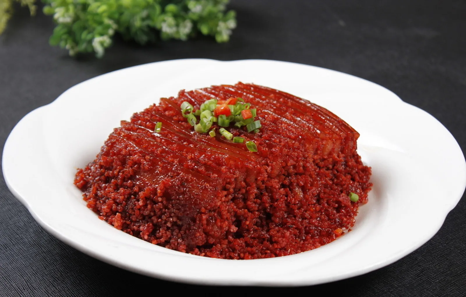 Steamed seasoned pork representing adapted Chinese food traditions abroad