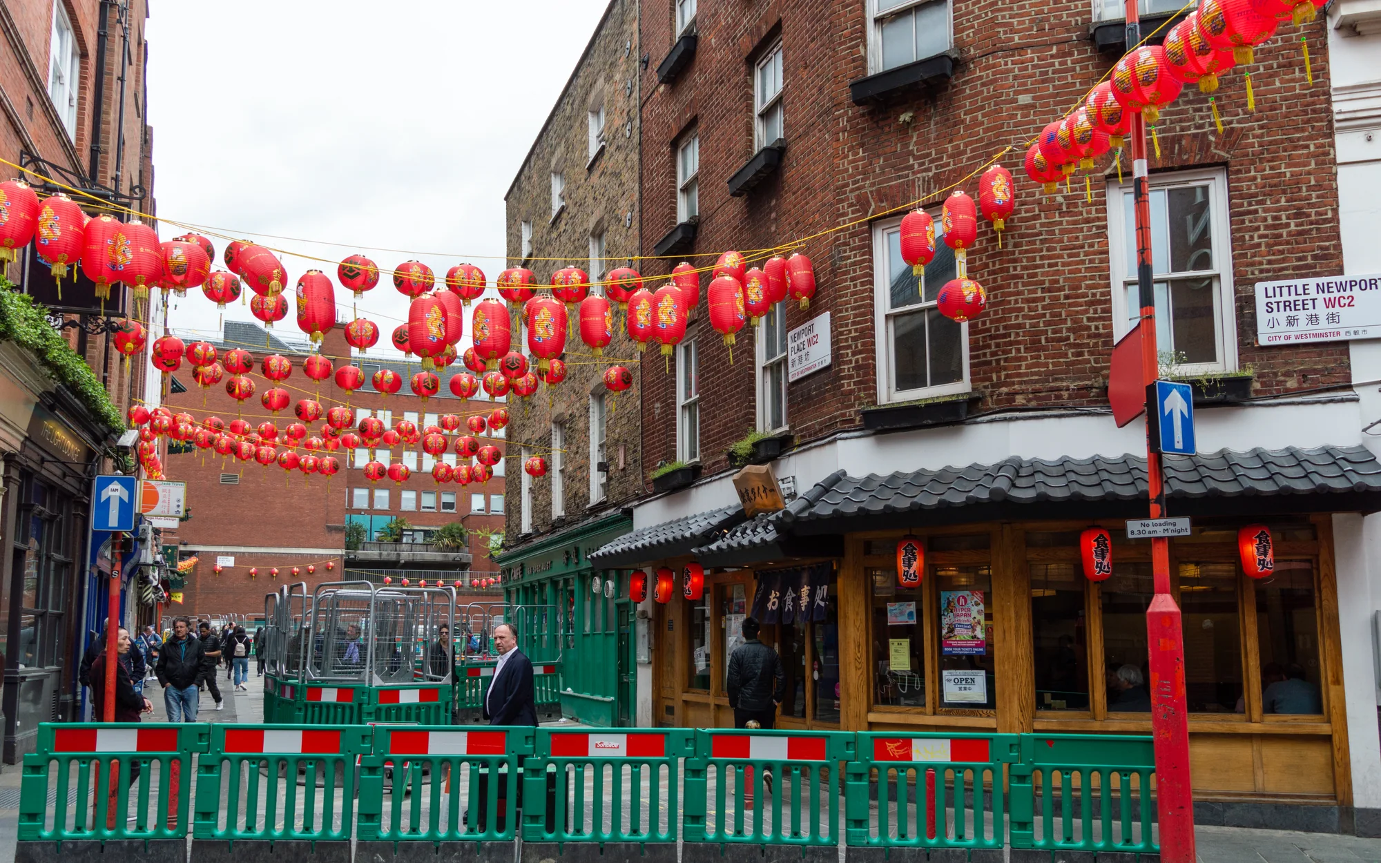 Chinese restaurant storefronts and red lanterns on Little Newport Street in London's Chinatown