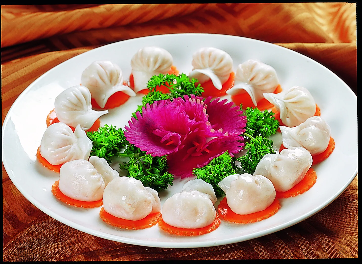 Crystal shrimp dumplings showing the thin wrapper and visible filling expected at Guangzhou morning tea