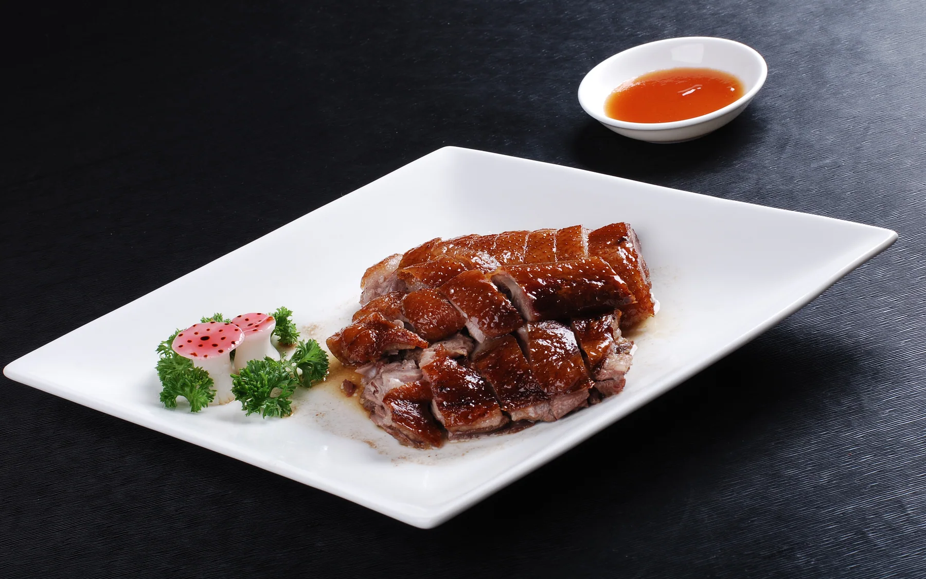 Deep-well-style roast goose with lacquered skin and visible rendered layers