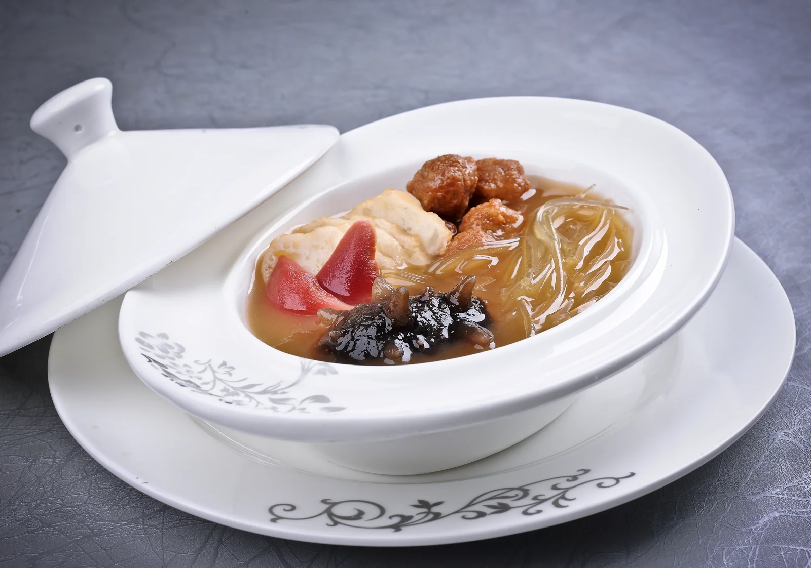 A bowl of thick Henan hulatang with vegetables, gluten and peppery broth