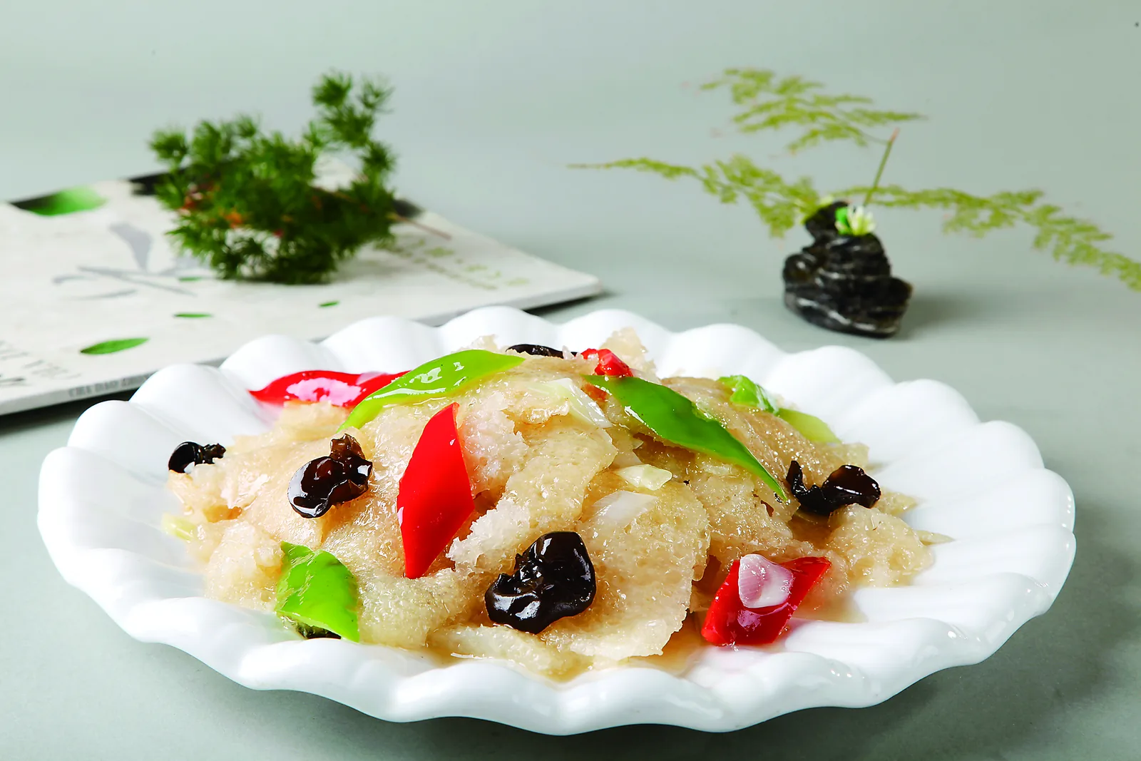 Golden puffed pork skin showing the porous structure used in pidu noodles