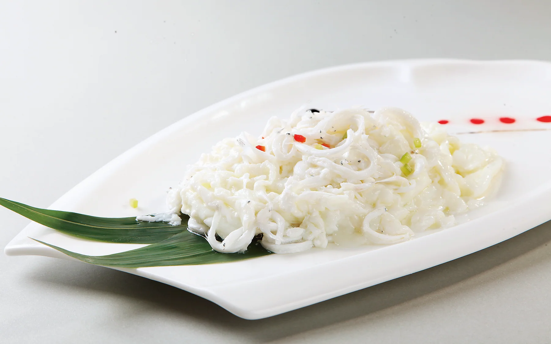 Stir-fried Taihu silver fish showing the delicate seasonal ingredients behind Suzhou's lake table