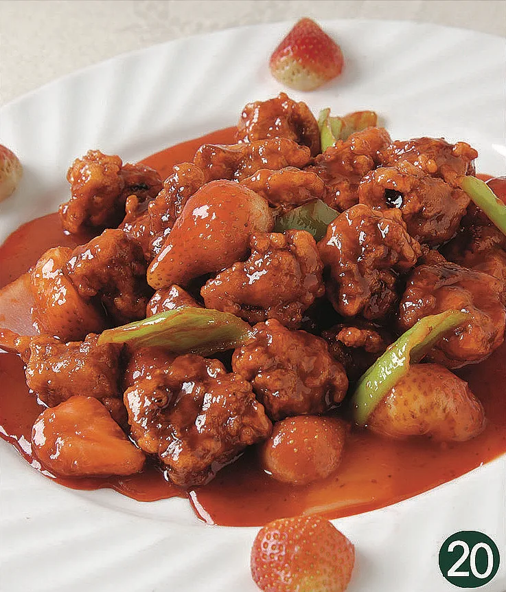 Small ribs covered in a glossy red-brown sweet-sour sauce