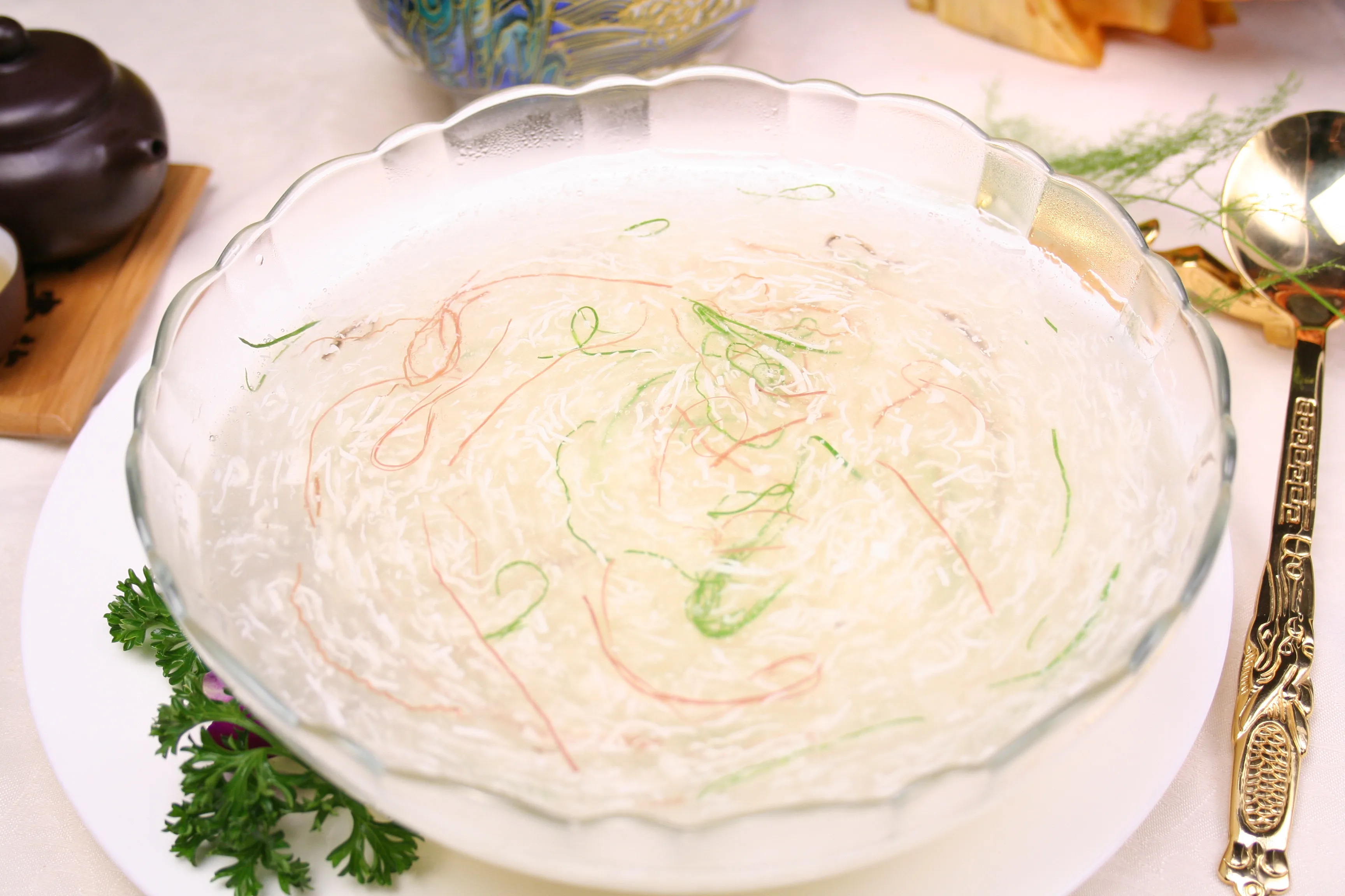 Fine strands of Wensi tofu in broth showing how knife work changes a modest ingredient