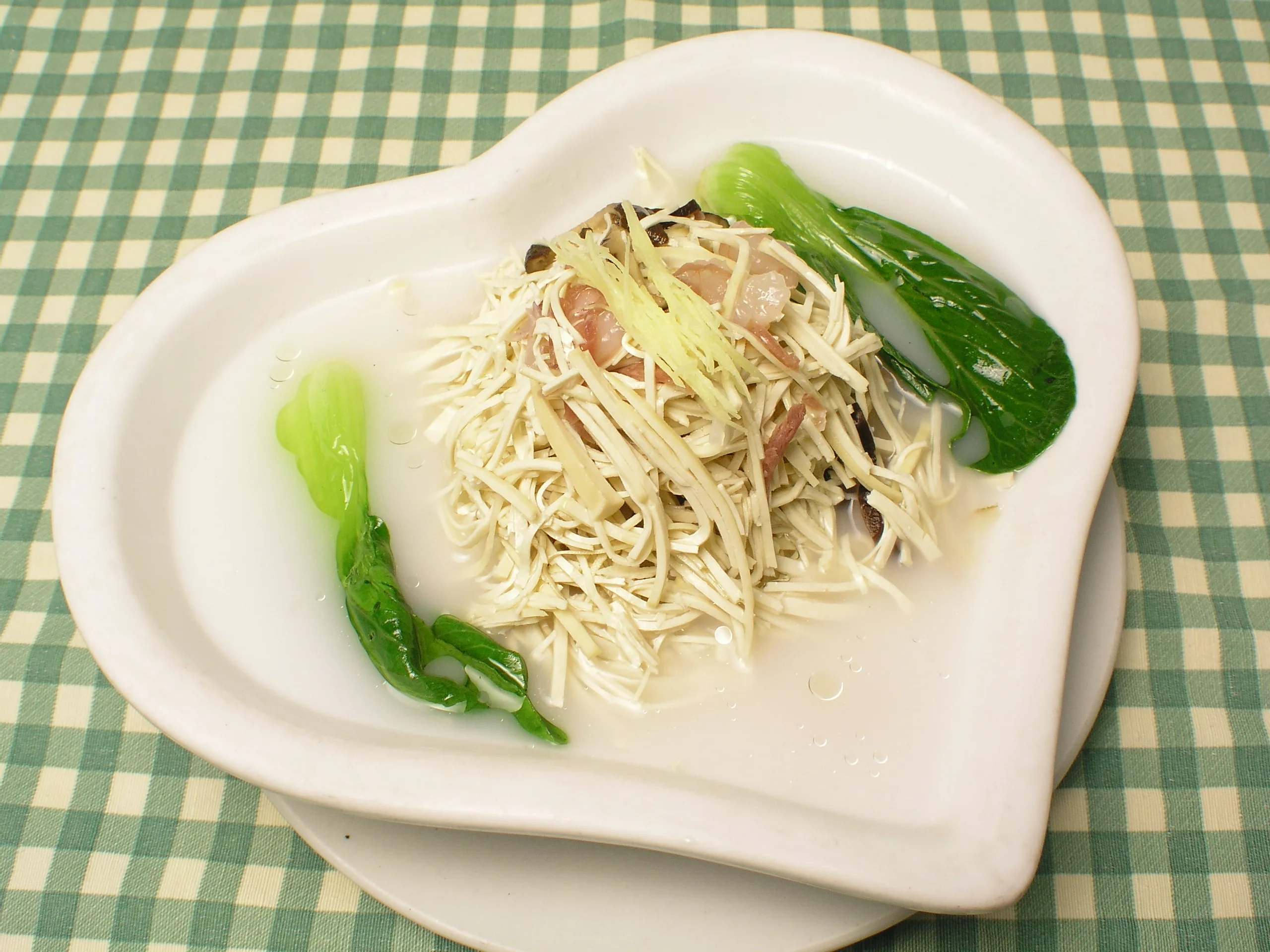 Dry-dressed shredded tofu in a Yangzhou preparation that emphasizes strand texture without a full bowl of broth