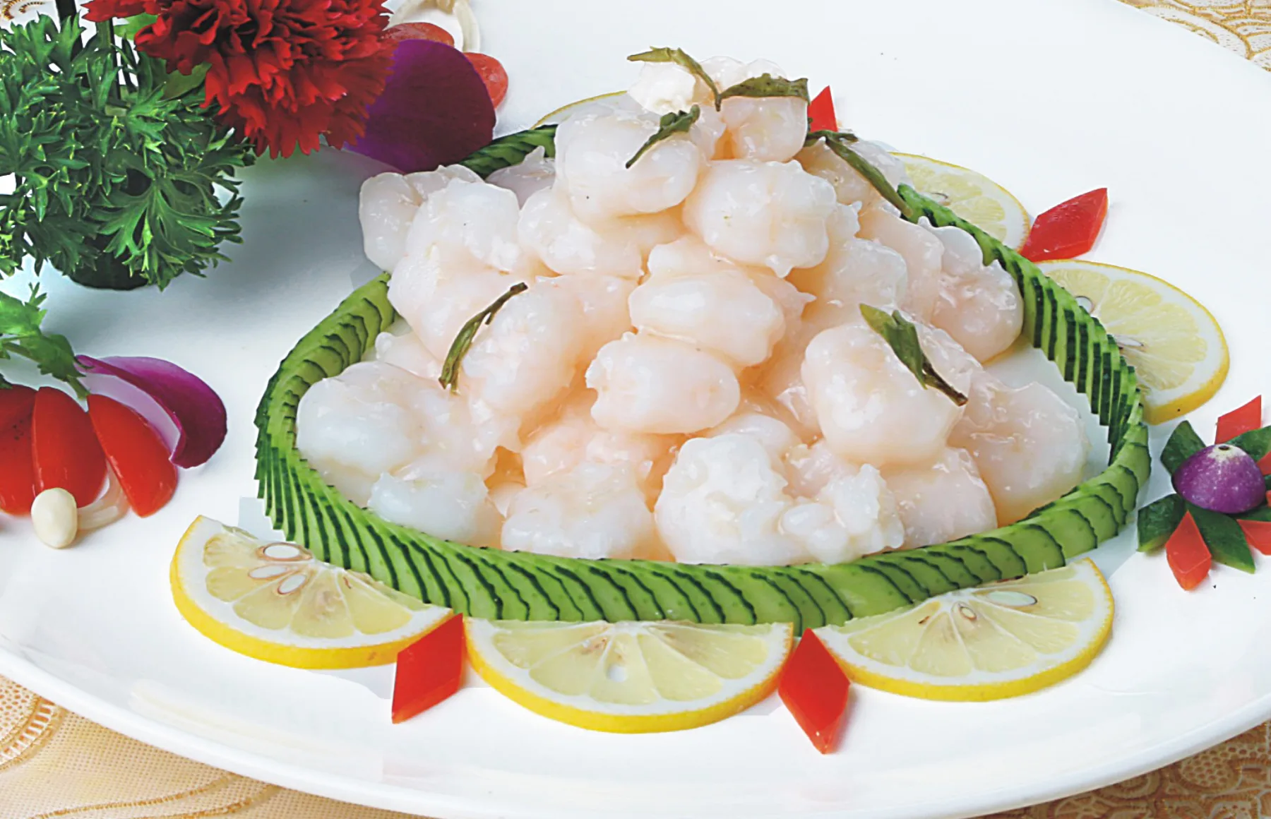 Pale shrimp with green tea leaves in a Hangzhou-style Longjing shrimp dish