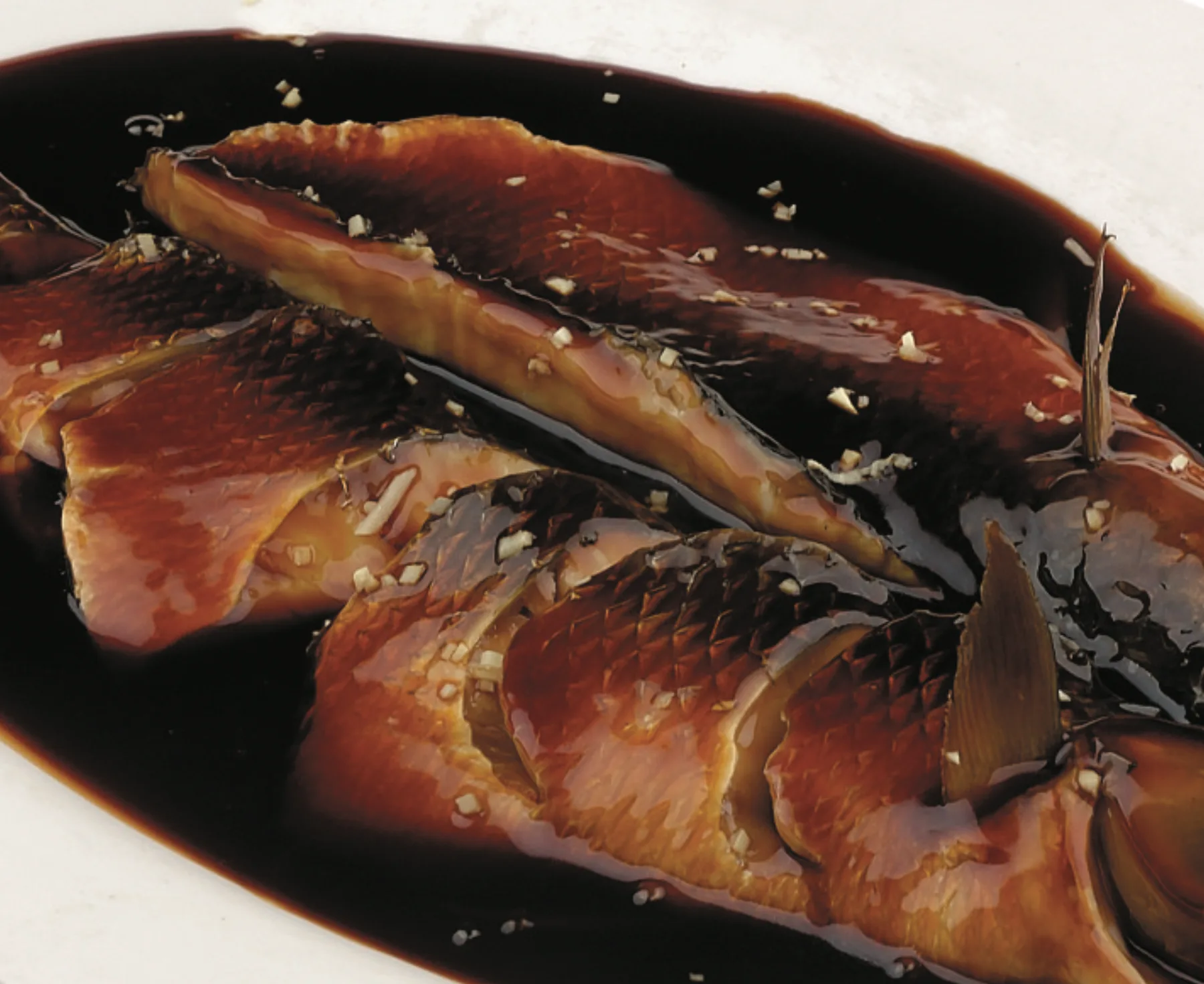 West Lake vinegar fish in a dark glossy sweet-sour sauce