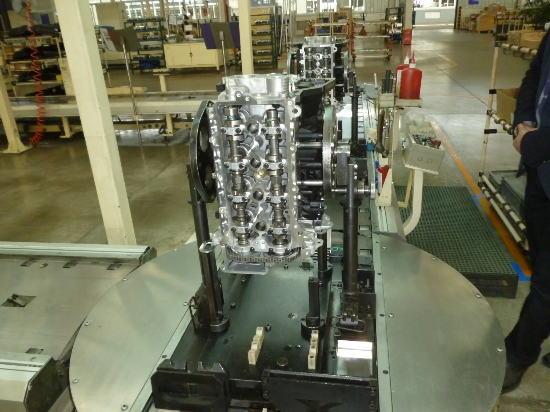 Engine assemblies on production fixtures in Mianyang in 2016; explore the manufacturing guide for the process behind a product