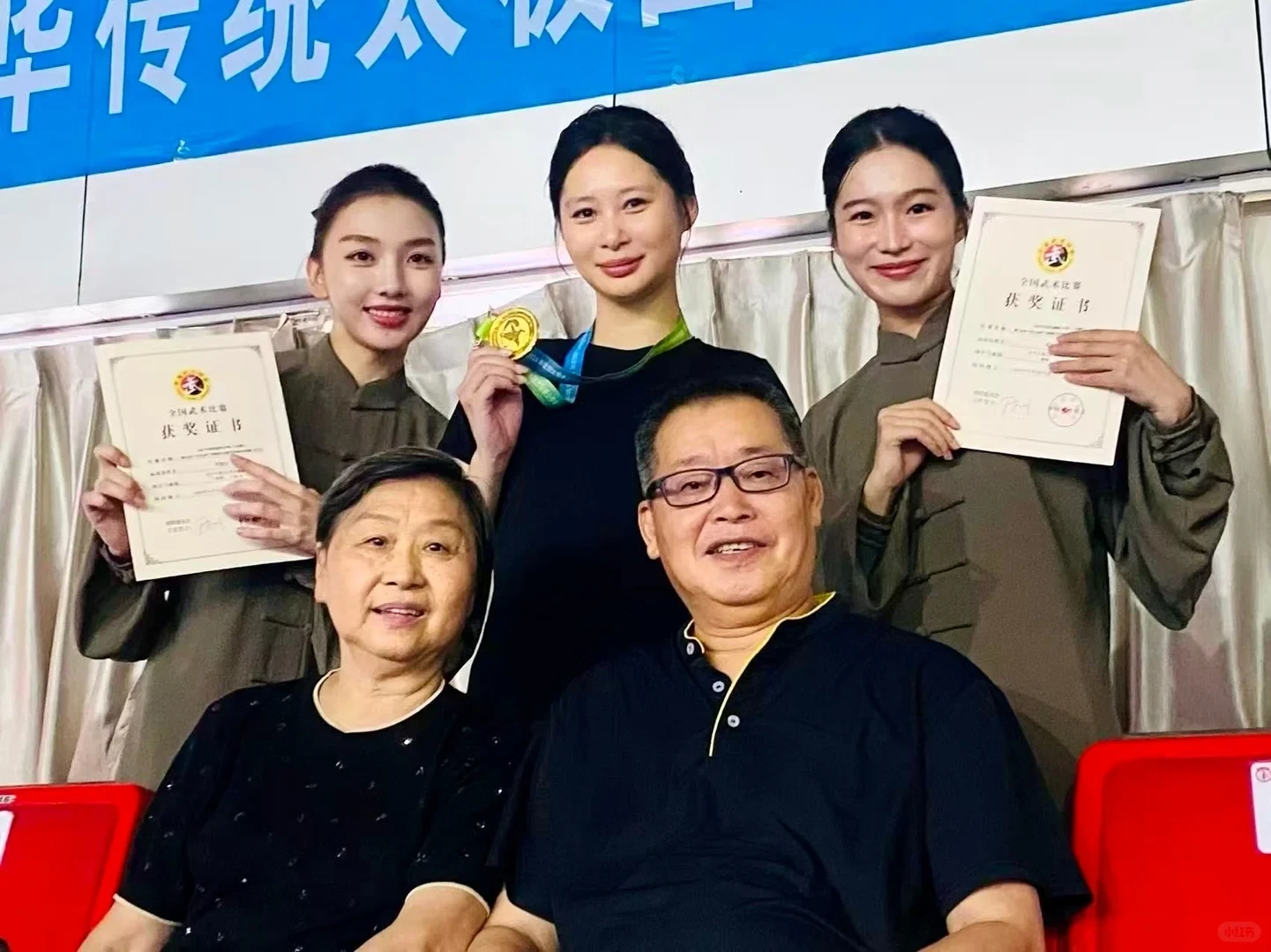Tai chi competitors and companions gathering after an event as a small practice community