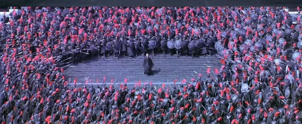 A lone figure is surrounded by the massed Qin army in Hero 2002