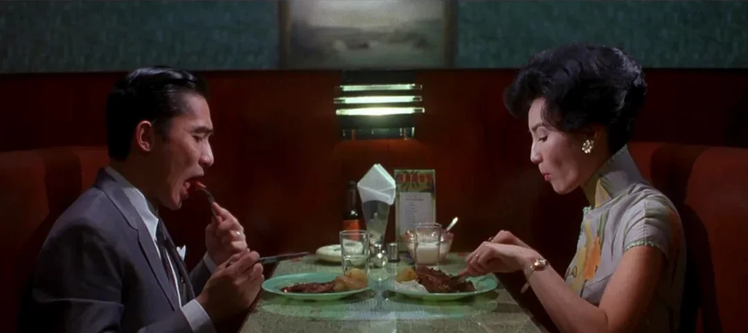 Chow and Su rehearse intimacy across a restaurant table in In the Mood for Love