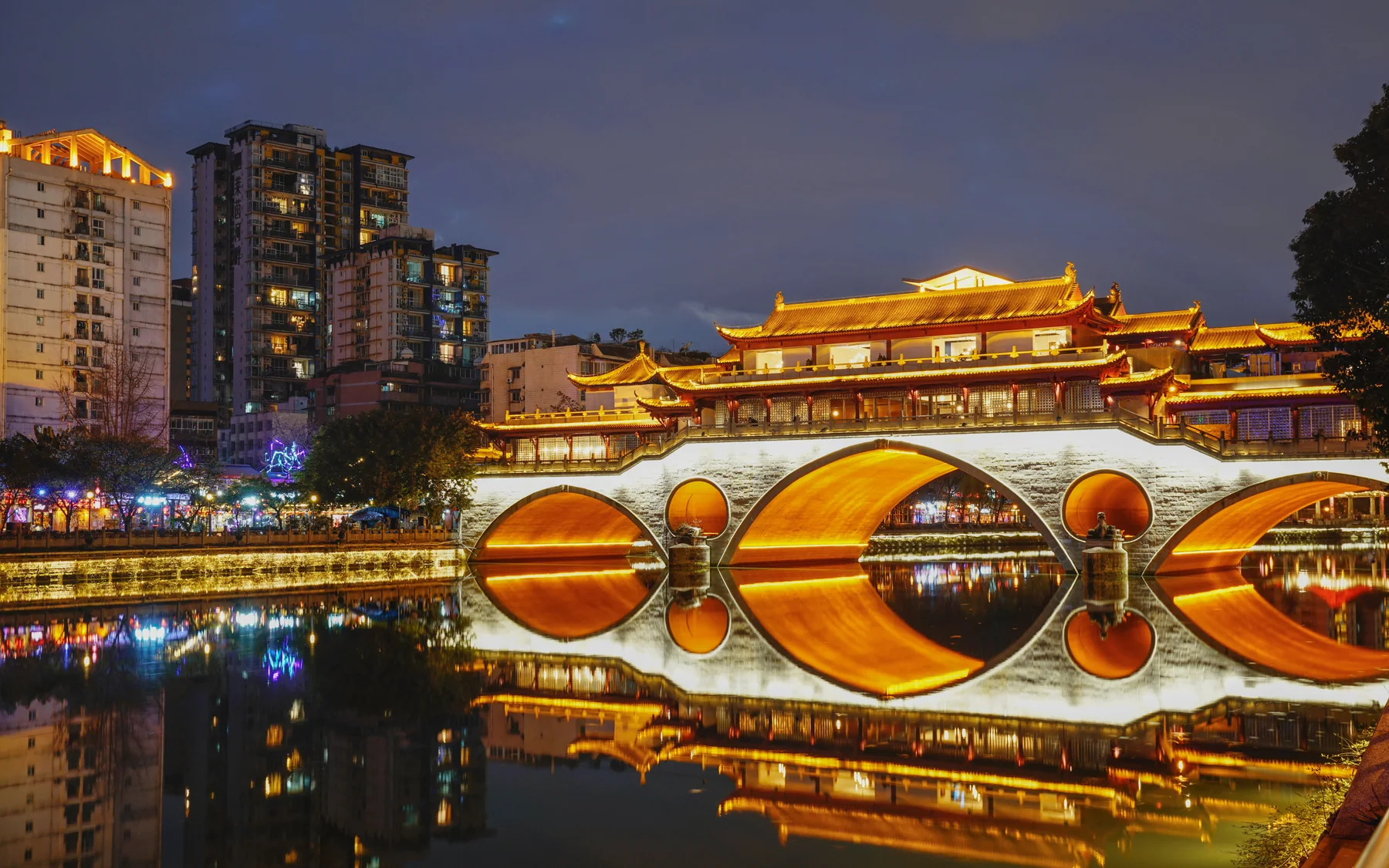 Jiuyan Bridge at night as evidence of the late-hour social geography around Chengdu music