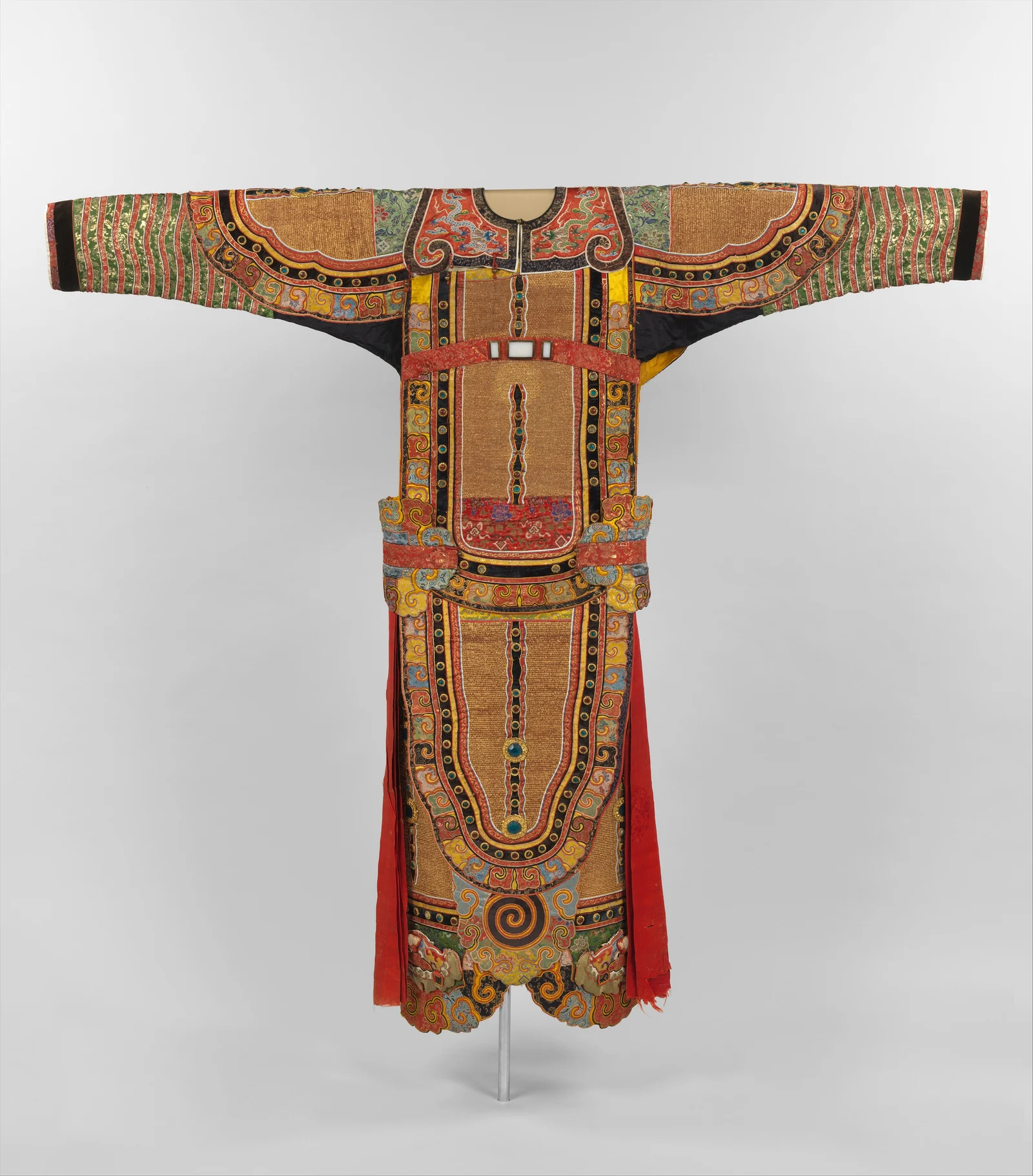 An eighteenth-century Chinese theatrical costume for a warrior, displayed flat to reveal its broad sleeves, embroidered armour panels and long vertical structure